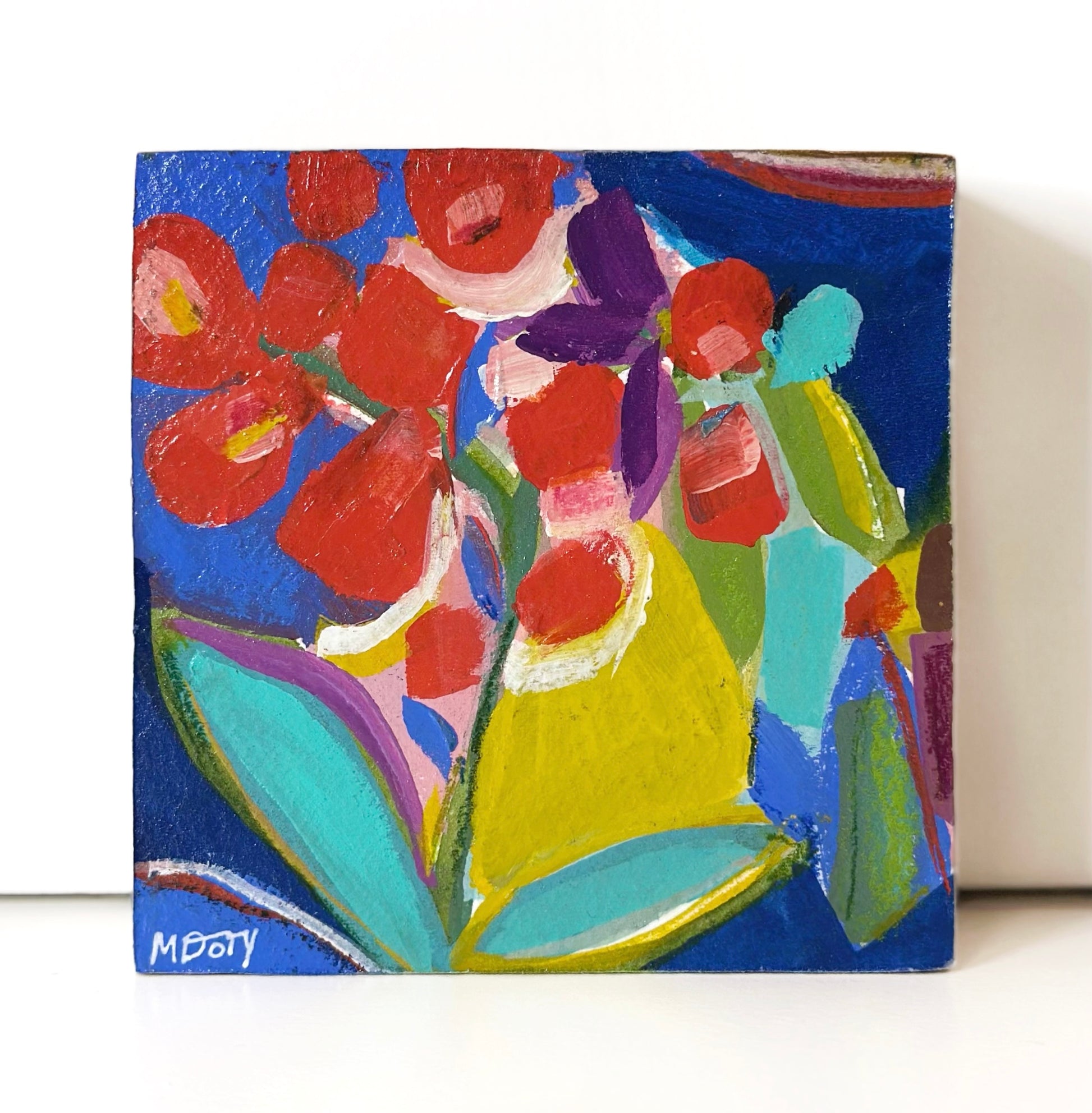Colorful abstract floral painting on wood panel.