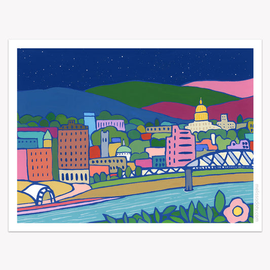 Colorful illustration of Charleston WV with buildings, a bridge, and mountains under a starry night sky on a vinyl sticker