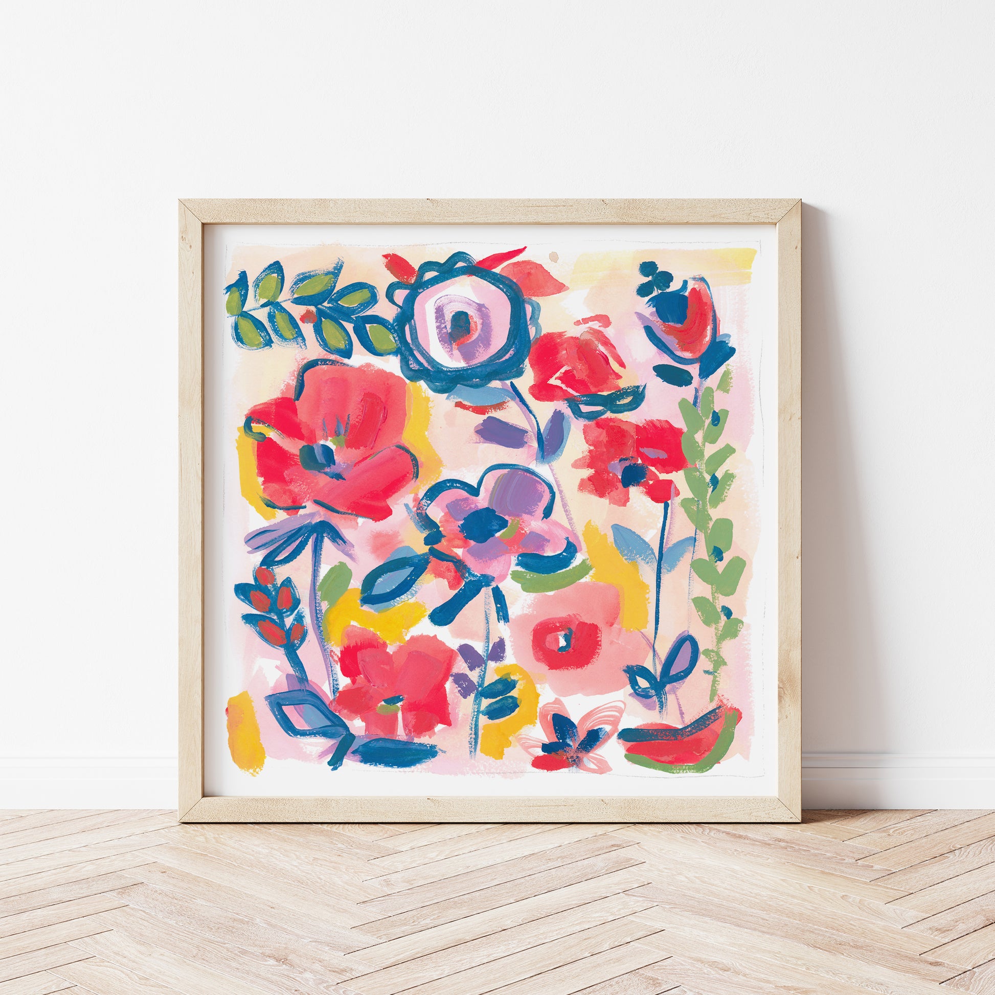 Playful and colorful floral art print in a wood frame against a white background.