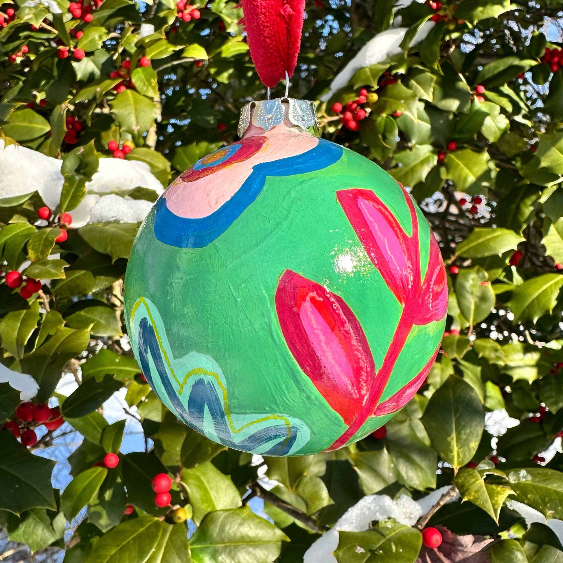 Red and green floral hand painted ceramic christmas ornament