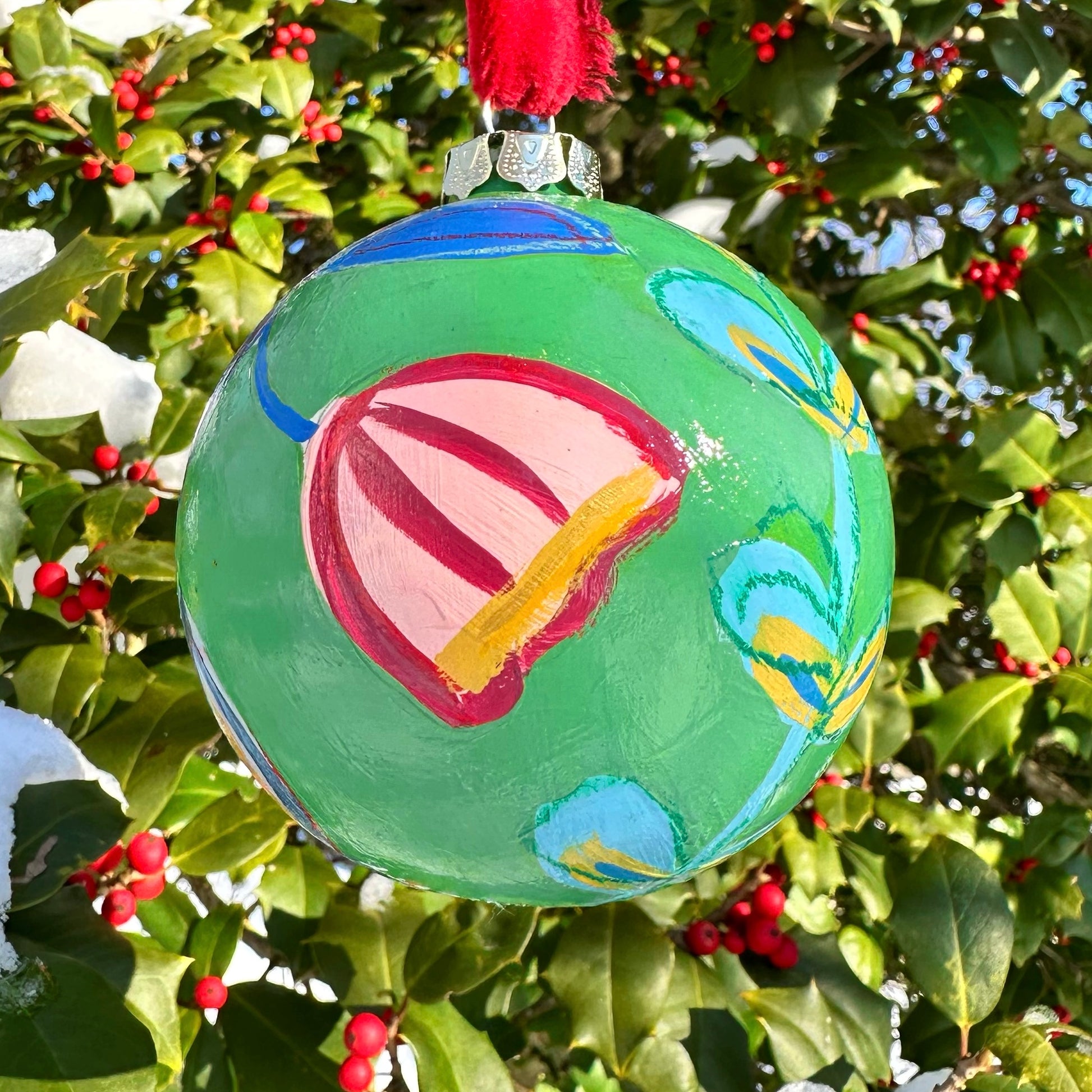 Red and green floral hand painted ceramic christmas ornament