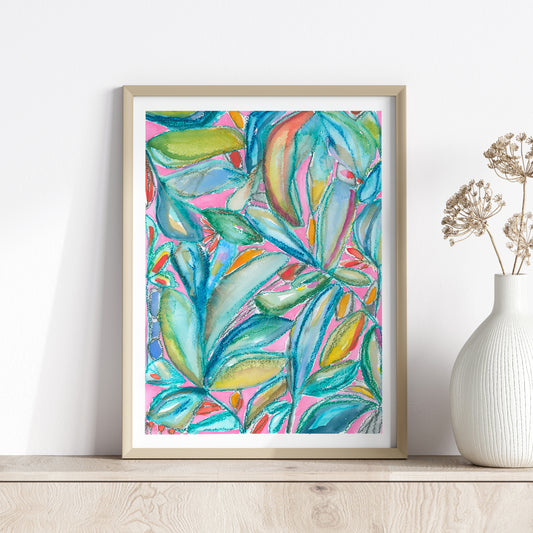 Pink, green and blue abstract leafy art print in a wood frame.