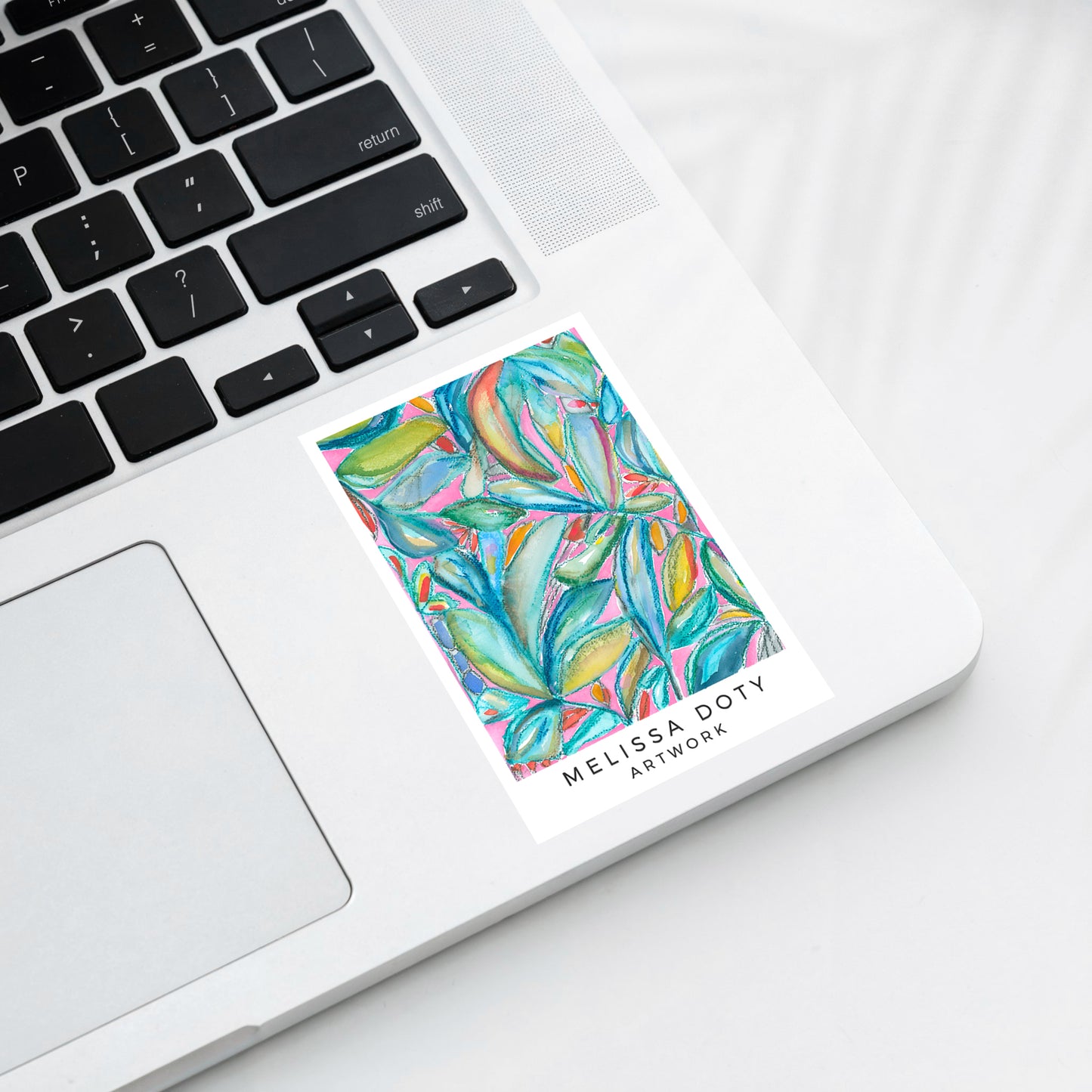 Colorful floral vinyl sticker on laptop